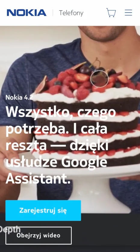 Strona Nokii 4.2 na ekranie telefonu: mężczyzna trzyma tort, hasło o Google Assistant i niebieski przycisk „Zarejestruj się”